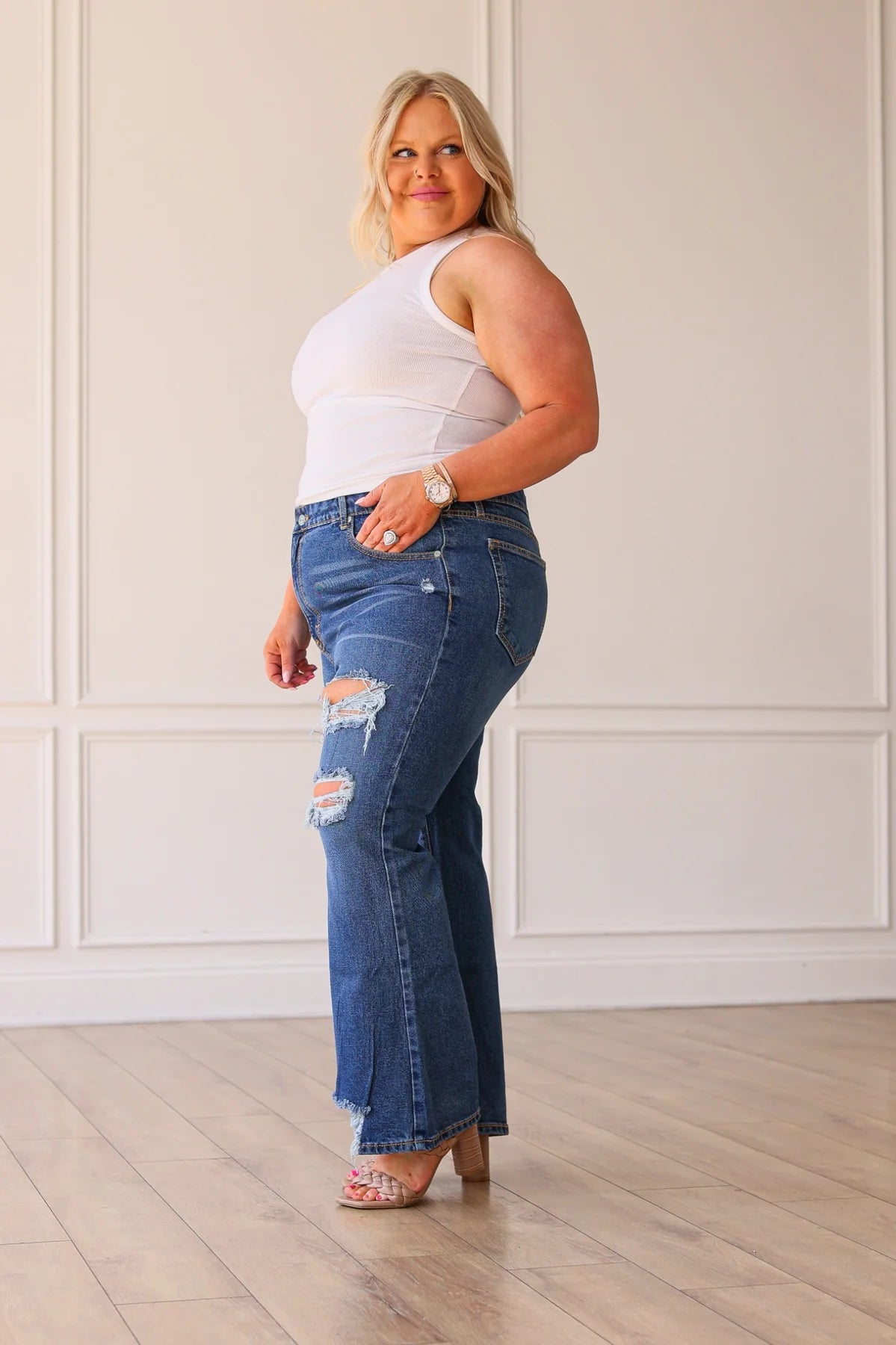 Blake Mid Washed Mid Rise Distressed Crop Flare Jeans