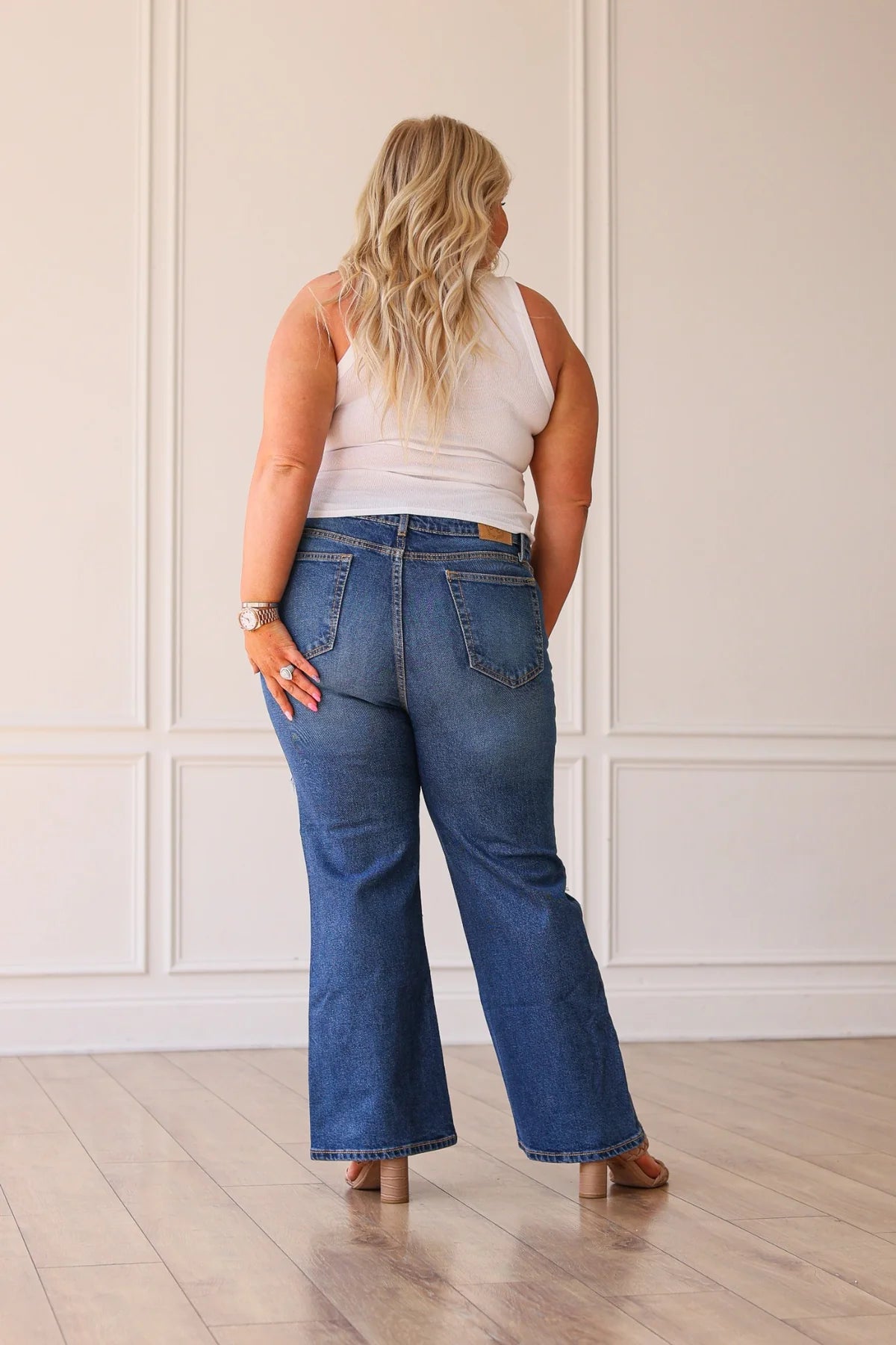 Blake Mid Washed Mid Rise Distressed Crop Flare Jeans